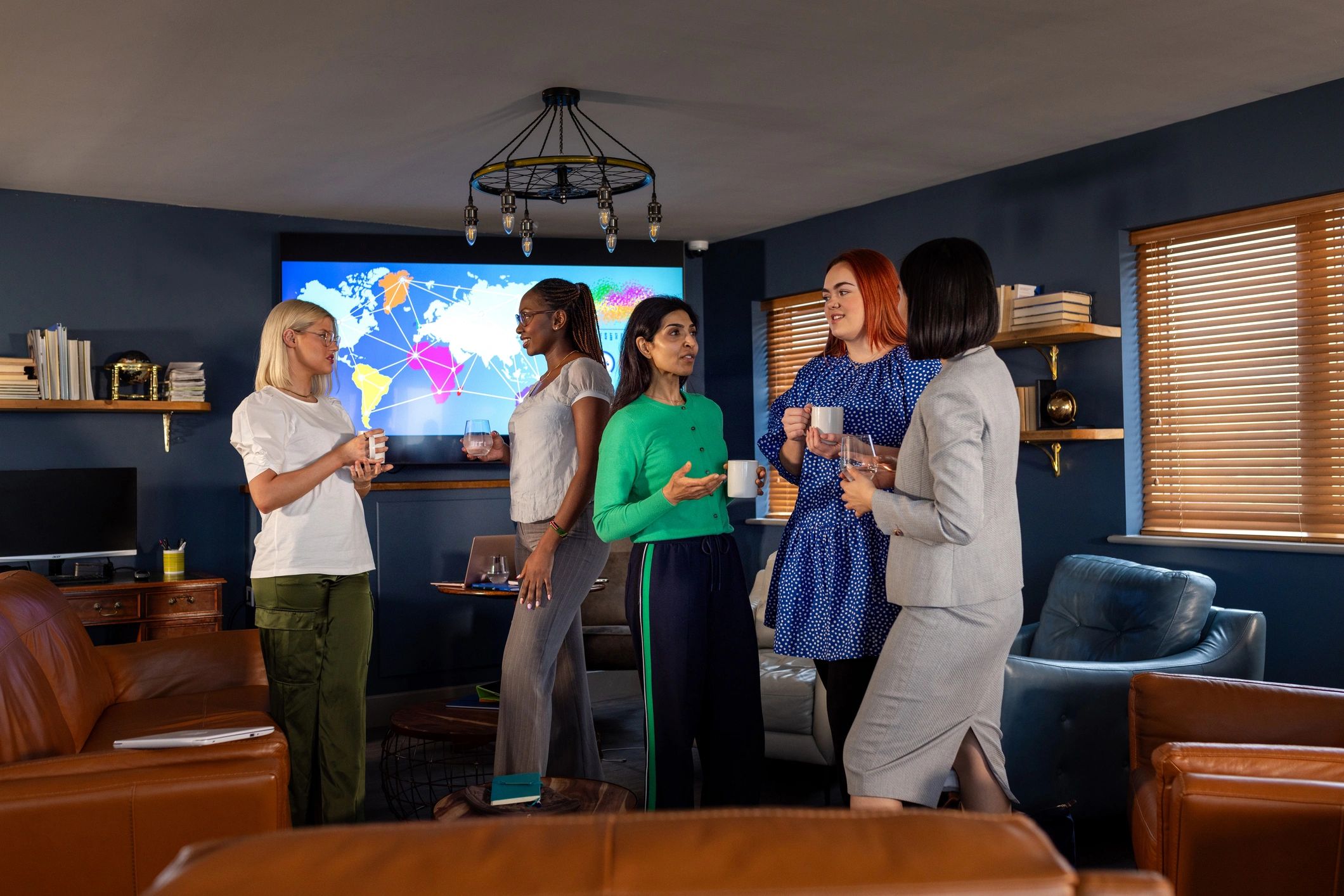 Women talking together during a networking break