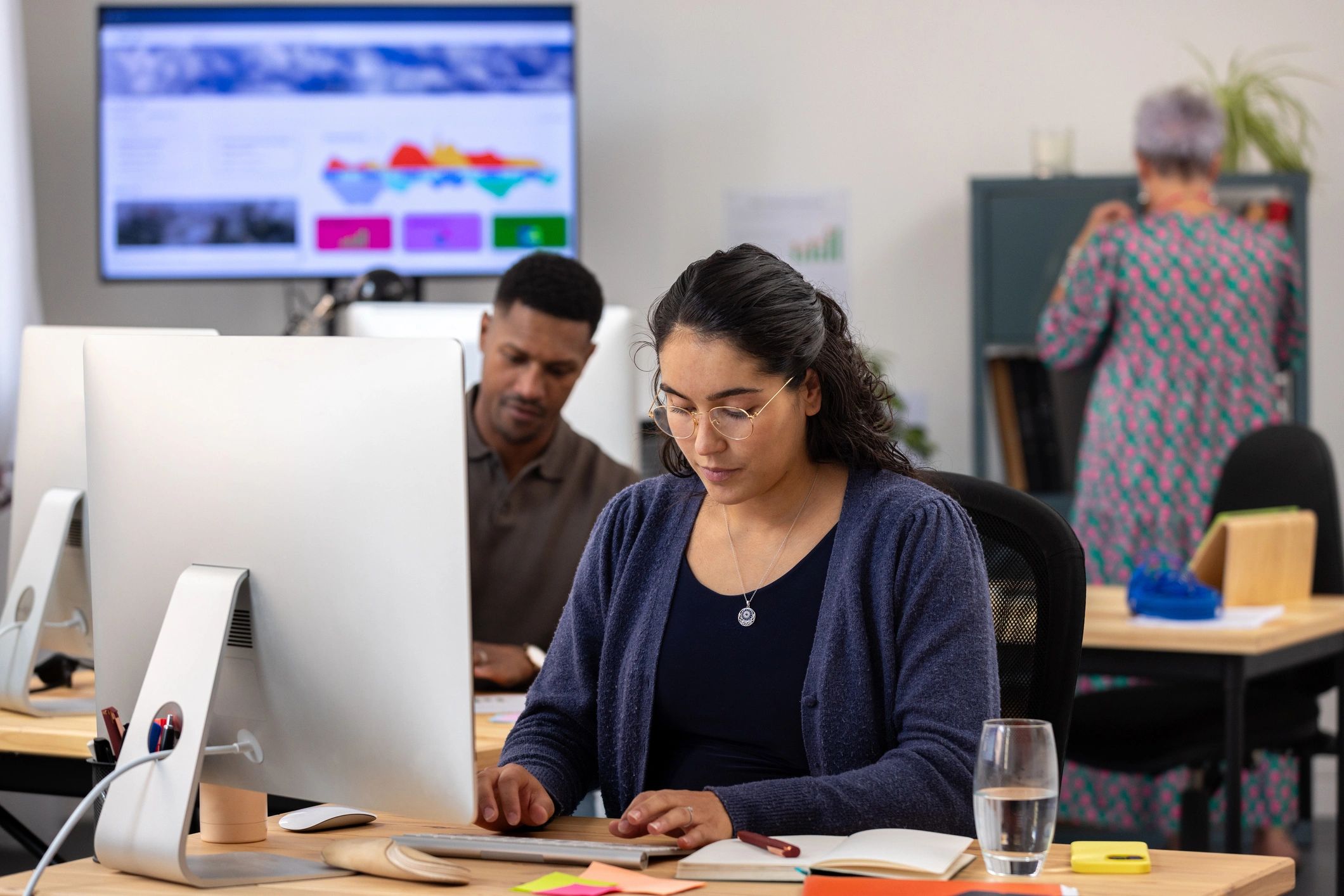 Woman focused on learning and working at a computer